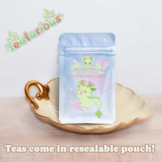 Berry Dragoncake instant tea resealable pouch with a cute dragon design displayed on a decorative plate for food and beverage packaging.